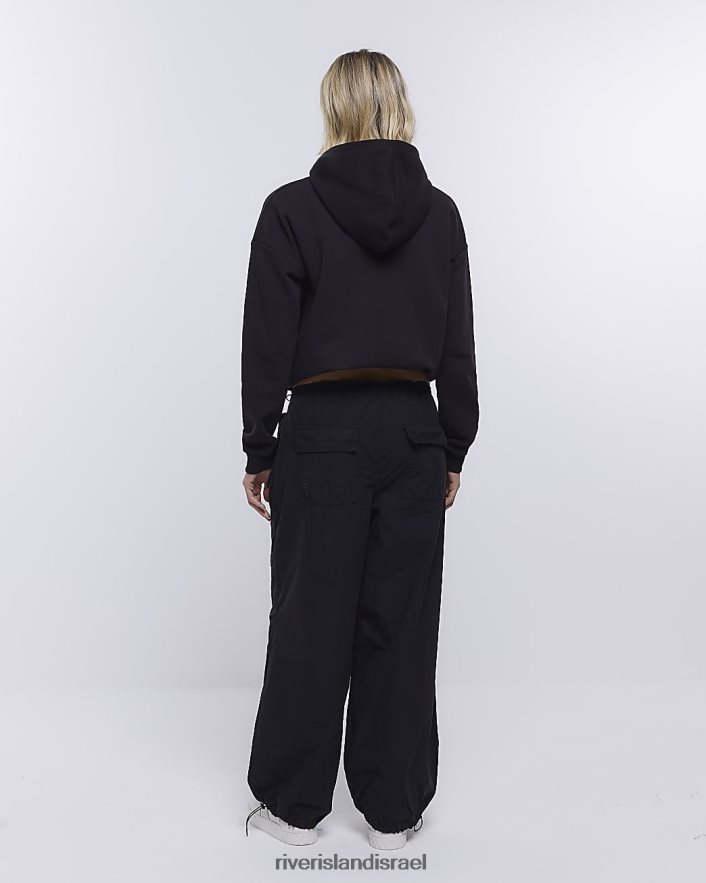 לבוש River Island מכנסי מצנח בגזרה נמוכה שָׁחוֹר נשים BDZ4081336